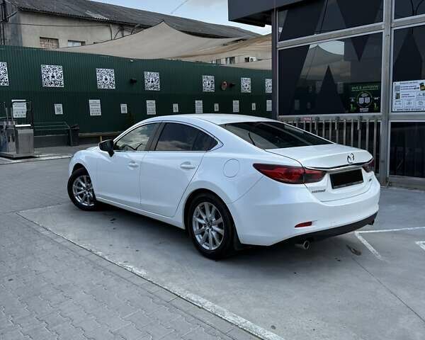 Белый Мазда 6, объемом двигателя 2 л и пробегом 116 тыс. км за 14499 $, фото 1 на Automoto.ua