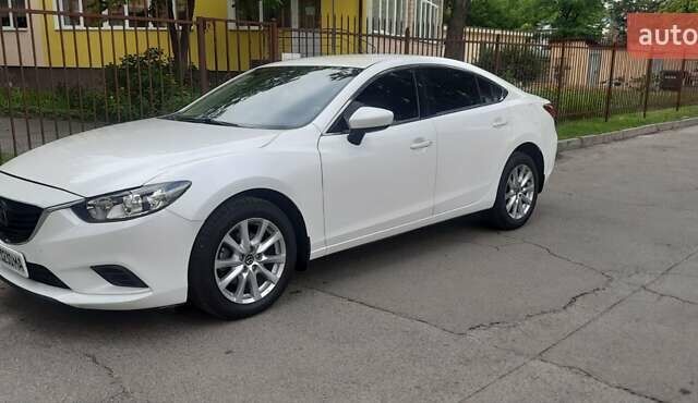 Белый Мазда 6, объемом двигателя 2.49 л и пробегом 75 тыс. км за 14500 $, фото 1 на Automoto.ua