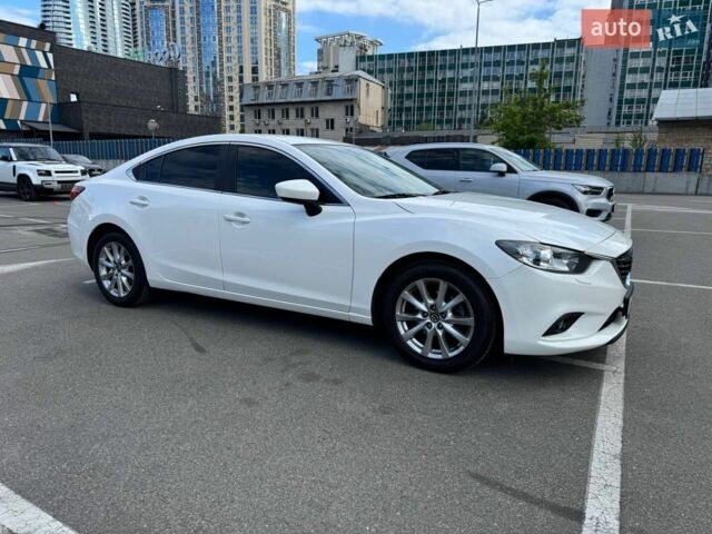 Білий Мазда 6, об'ємом двигуна 2 л та пробігом 183 тис. км за 12900 $, фото 13 на Automoto.ua