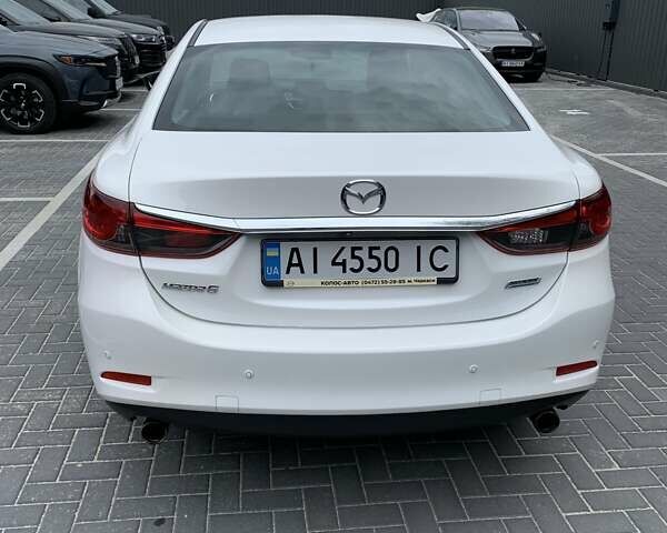 Белый Мазда 6, объемом двигателя 2 л и пробегом 86 тыс. км за 16700 $, фото 2 на Automoto.ua