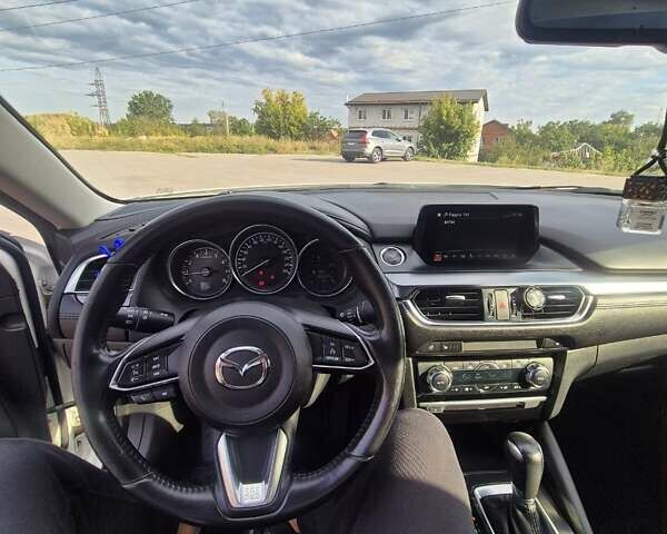 Білий Мазда 6, об'ємом двигуна 2 л та пробігом 105 тис. км за 16300 $, фото 11 на Automoto.ua