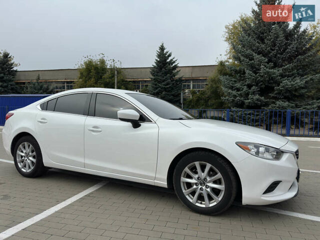 Белый Мазда 6, объемом двигателя 2.49 л и пробегом 138 тыс. км за 12800 $, фото 1 на Automoto.ua