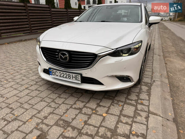 Белый Мазда 6, объемом двигателя 2.49 л и пробегом 66 тыс. км за 19000 $, фото 1 на Automoto.ua