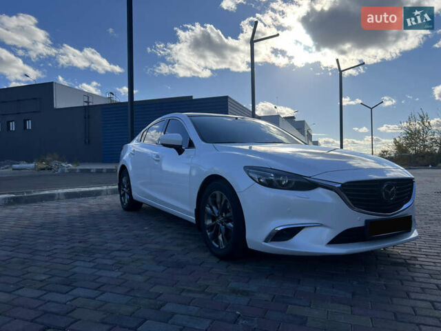 Білий Мазда 6, об'ємом двигуна 2.49 л та пробігом 70 тис. км за 19000 $, фото 2 на Automoto.ua