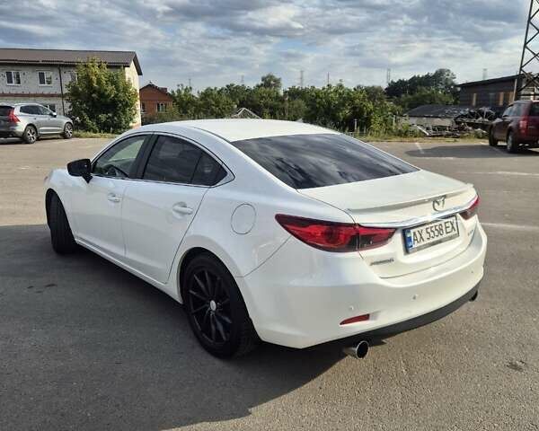 Білий Мазда 6, об'ємом двигуна 2 л та пробігом 105 тис. км за 16300 $, фото 4 на Automoto.ua