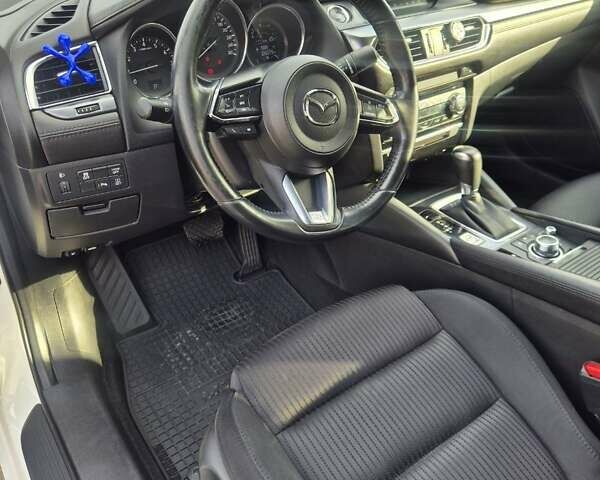 Білий Мазда 6, об'ємом двигуна 2 л та пробігом 105 тис. км за 16300 $, фото 13 на Automoto.ua