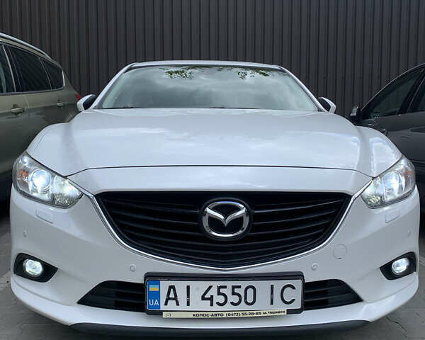 Белый Мазда 6, объемом двигателя 2 л и пробегом 86 тыс. км за 16700 $, фото 18 на Automoto.ua