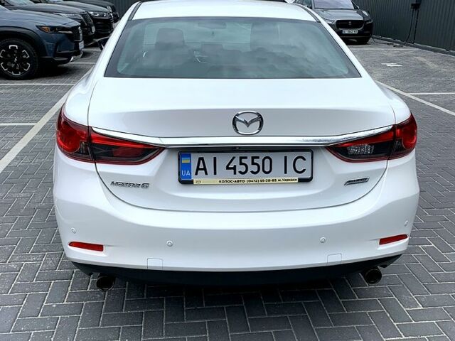 Білий Мазда 6, об'ємом двигуна 2 л та пробігом 65 тис. км за 17200 $, фото 6 на Automoto.ua