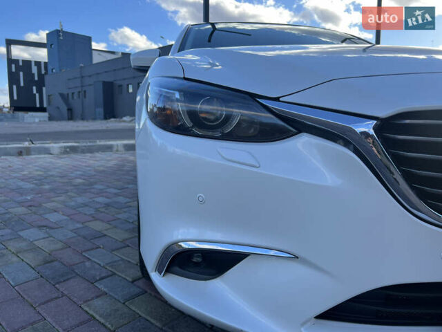 Білий Мазда 6, об'ємом двигуна 2.49 л та пробігом 70 тис. км за 19000 $, фото 4 на Automoto.ua