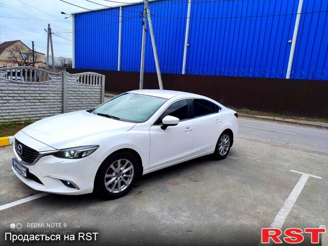 Белый Мазда 6, объемом двигателя 2.2 л и пробегом 180 тыс. км за 15000 $, фото 5 на Automoto.ua