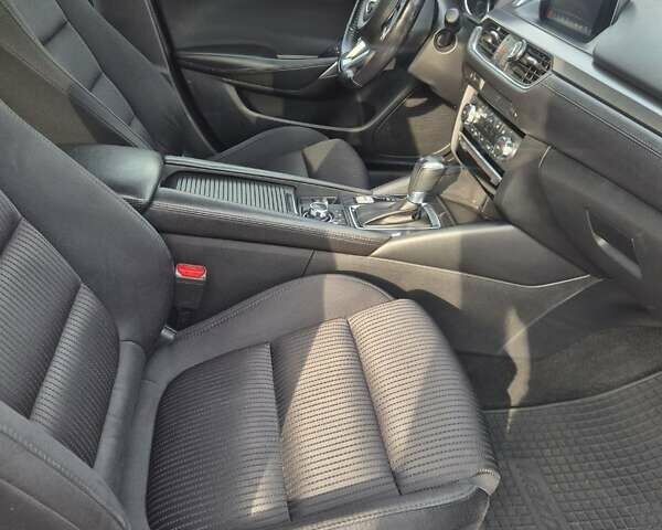 Білий Мазда 6, об'ємом двигуна 2 л та пробігом 105 тис. км за 16300 $, фото 6 на Automoto.ua