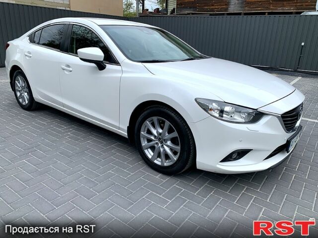 Білий Мазда 6, об'ємом двигуна 2 л та пробігом 65 тис. км за 17200 $, фото 2 на Automoto.ua
