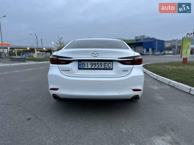 Белый Мазда 6, объемом двигателя 2.49 л и пробегом 92 тыс. км за 16000 $, фото 5 на Automoto.ua