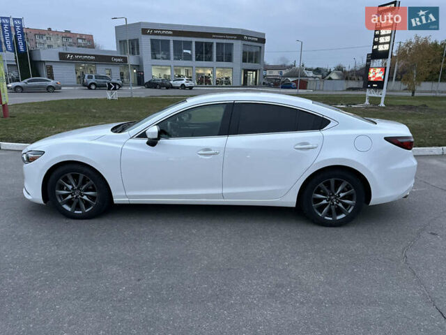 Белый Мазда 6, объемом двигателя 2.49 л и пробегом 92 тыс. км за 16000 $, фото 4 на Automoto.ua