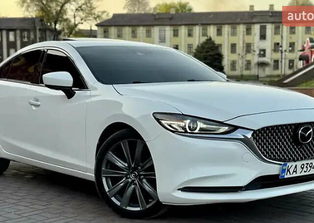 Белый Мазда 6, объемом двигателя 2.49 л и пробегом 89 тыс. км за 19000 $, фото 1 на Automoto.ua