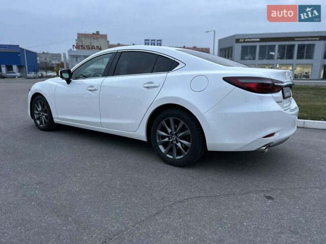 Белый Мазда 6, объемом двигателя 2.49 л и пробегом 92 тыс. км за 16000 $, фото 6 на Automoto.ua