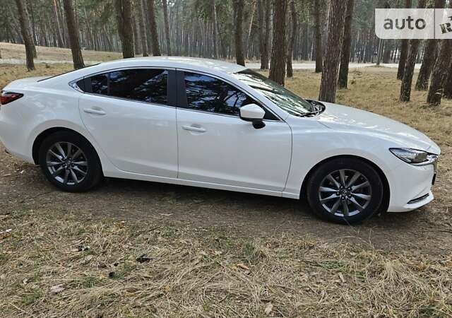 Белый Мазда 6, объемом двигателя 2 л и пробегом 86 тыс. км за 21800 $, фото 5 на Automoto.ua