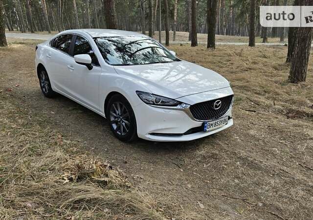 Белый Мазда 6, объемом двигателя 2 л и пробегом 86 тыс. км за 21800 $, фото 1 на Automoto.ua