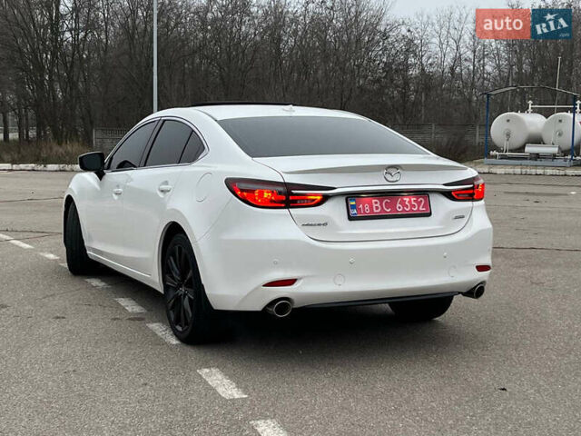 Белый Мазда 6, объемом двигателя 2.49 л и пробегом 70 тыс. км за 19999 $, фото 2 на Automoto.ua