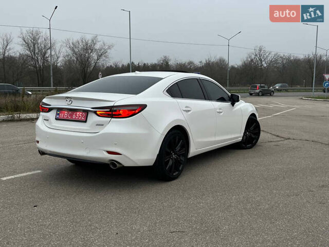 Белый Мазда 6, объемом двигателя 2.49 л и пробегом 70 тыс. км за 19999 $, фото 1 на Automoto.ua