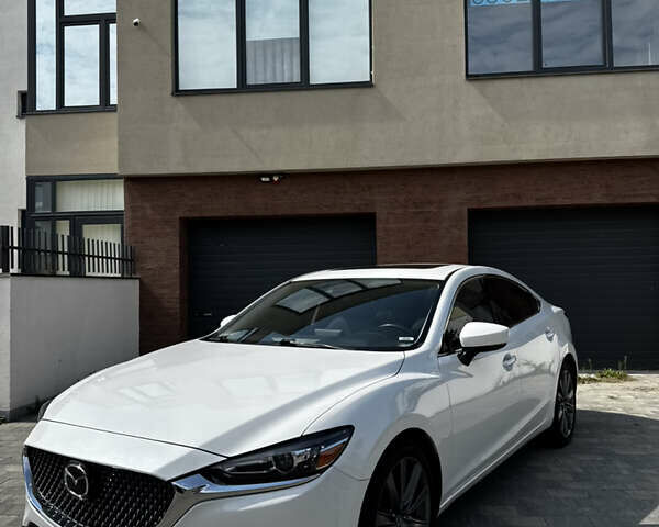 Білий Мазда 6, об'ємом двигуна 2.49 л та пробігом 175 тис. км за 16999 $, фото 8 на Automoto.ua