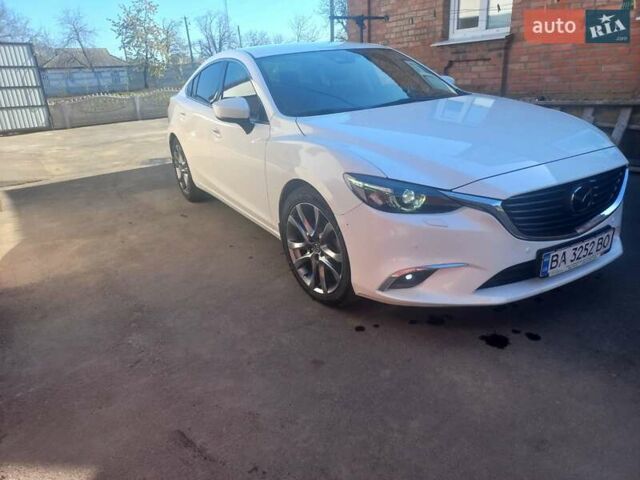 Білий Мазда 6, об'ємом двигуна 2.2 л та пробігом 69 тис. км за 21500 $, фото 2 на Automoto.ua