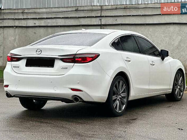 Белый Мазда 6, объемом двигателя 2.49 л и пробегом 95 тыс. км за 15400 $, фото 8 на Automoto.ua