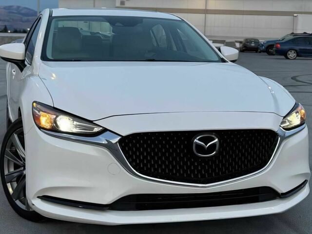 Белый Мазда 6, объемом двигателя 2.5 л и пробегом 44 тыс. км за 9100 $, фото 1 на Automoto.ua