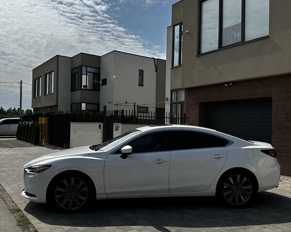 Білий Мазда 6, об'ємом двигуна 2.49 л та пробігом 175 тис. км за 16999 $, фото 2 на Automoto.ua