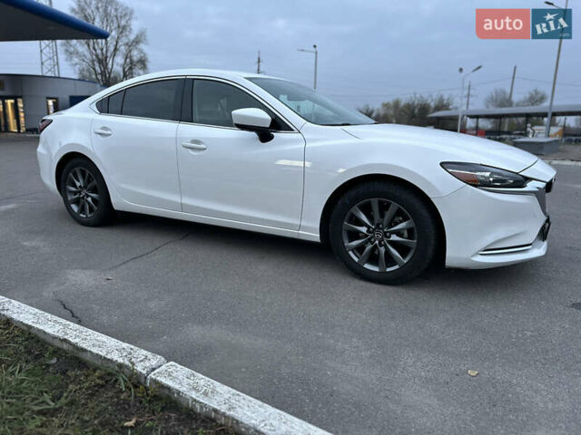 Белый Мазда 6, объемом двигателя 2.49 л и пробегом 92 тыс. км за 16000 $, фото 1 на Automoto.ua