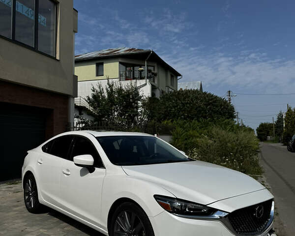 Білий Мазда 6, об'ємом двигуна 2.49 л та пробігом 175 тис. км за 16999 $, фото 7 на Automoto.ua