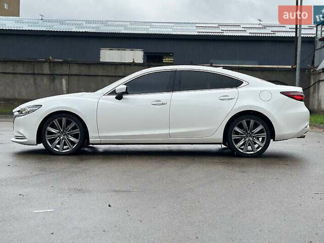 Белый Мазда 6, объемом двигателя 2.49 л и пробегом 95 тыс. км за 15400 $, фото 5 на Automoto.ua