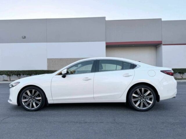 Білий Мазда 6, об'ємом двигуна 2.5 л та пробігом 33 тис. км за 6750 $, фото 4 на Automoto.ua