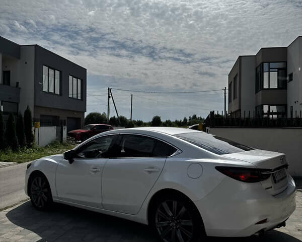 Білий Мазда 6, об'ємом двигуна 2.49 л та пробігом 175 тис. км за 16999 $, фото 1 на Automoto.ua