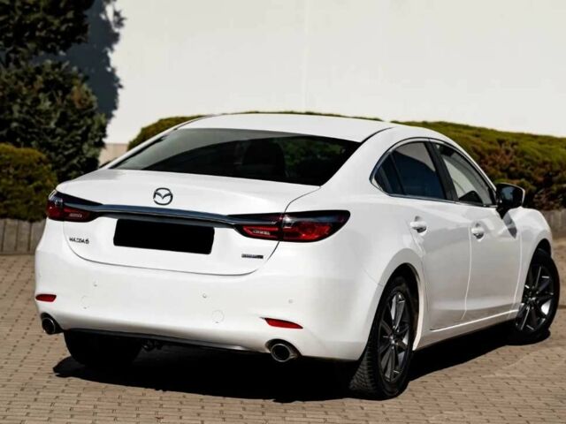 Білий Мазда 6, об'ємом двигуна 2.5 л та пробігом 81 тис. км за 9900 $, фото 12 на Automoto.ua