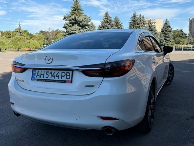 Білий Мазда 6, об'ємом двигуна 2.49 л та пробігом 105 тис. км за 19000 $, фото 4 на Automoto.ua