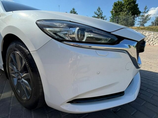 Білий Мазда 6, об'ємом двигуна 2 л та пробігом 28 тис. км за 22950 $, фото 10 на Automoto.ua