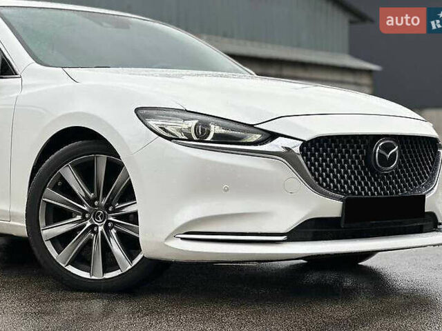 Белый Мазда 6, объемом двигателя 2.49 л и пробегом 95 тыс. км за 15400 $, фото 1 на Automoto.ua