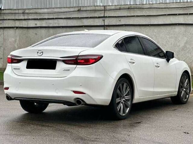 Белый Мазда 6, объемом двигателя 2.5 л и пробегом 95 тыс. км за 13400 $, фото 7 на Automoto.ua