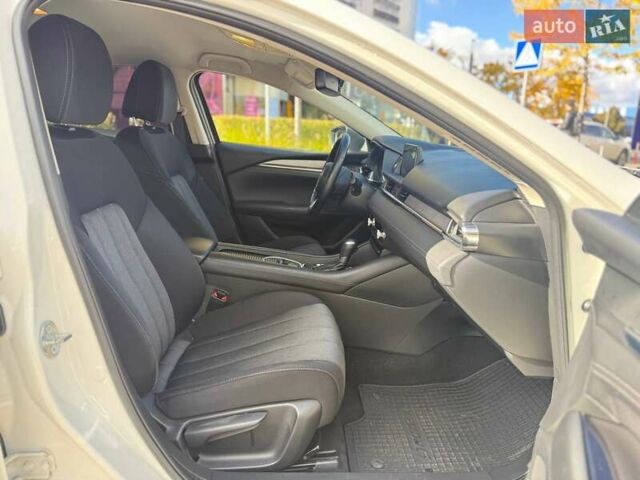 Білий Мазда 6, об'ємом двигуна 2 л та пробігом 134 тис. км за 20490 $, фото 11 на Automoto.ua