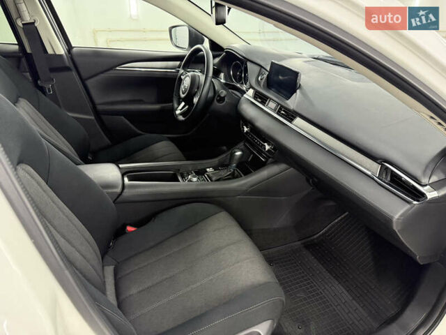 Белый Мазда 6, объемом двигателя 2 л и пробегом 110 тыс. км за 20500 $, фото 17 на Automoto.ua