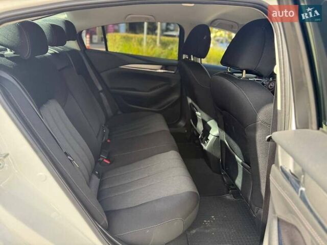 Білий Мазда 6, об'ємом двигуна 2 л та пробігом 134 тис. км за 20490 $, фото 10 на Automoto.ua