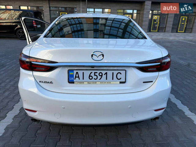 Белый Мазда 6, объемом двигателя 2 л и пробегом 134 тыс. км за 21100 $, фото 20 на Automoto.ua