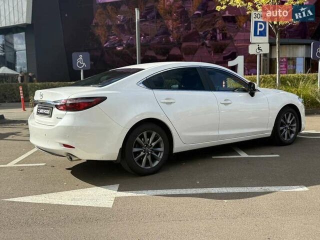 Білий Мазда 6, об'ємом двигуна 2 л та пробігом 134 тис. км за 20490 $, фото 5 на Automoto.ua