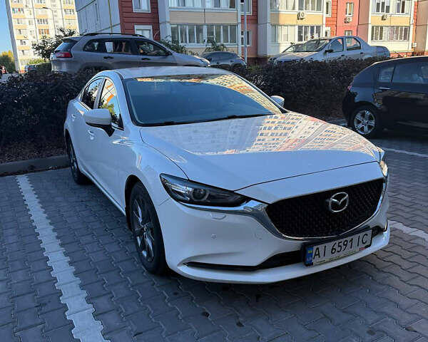 Белый Мазда 6, объемом двигателя 2 л и пробегом 134 тыс. км за 21100 $, фото 2 на Automoto.ua