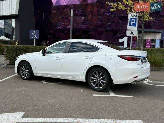 Білий Мазда 6, об'ємом двигуна 2 л та пробігом 134 тис. км за 20490 $, фото 3 на Automoto.ua