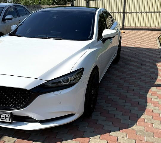 Белый Мазда 6, объемом двигателя 2 л и пробегом 113 тыс. км за 18000 $, фото 5 на Automoto.ua