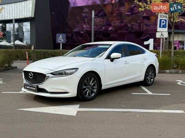 Білий Мазда 6, об'ємом двигуна 2 л та пробігом 134 тис. км за 20490 $, фото 2 на Automoto.ua