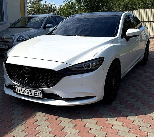 Белый Мазда 6, объемом двигателя 2 л и пробегом 113 тыс. км за 18000 $, фото 2 на Automoto.ua