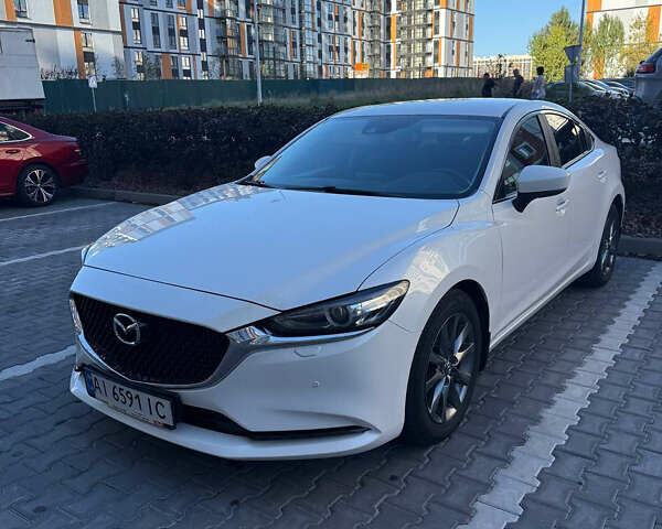 Белый Мазда 6, объемом двигателя 2 л и пробегом 134 тыс. км за 21100 $, фото 1 на Automoto.ua